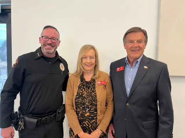 Cherry Hills Village Police Chief Jason Lyons with our Founders, Jan and Mark Griffin